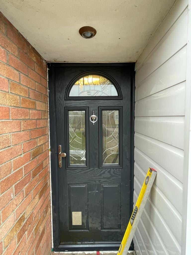 Black composite front door fitted in Essex