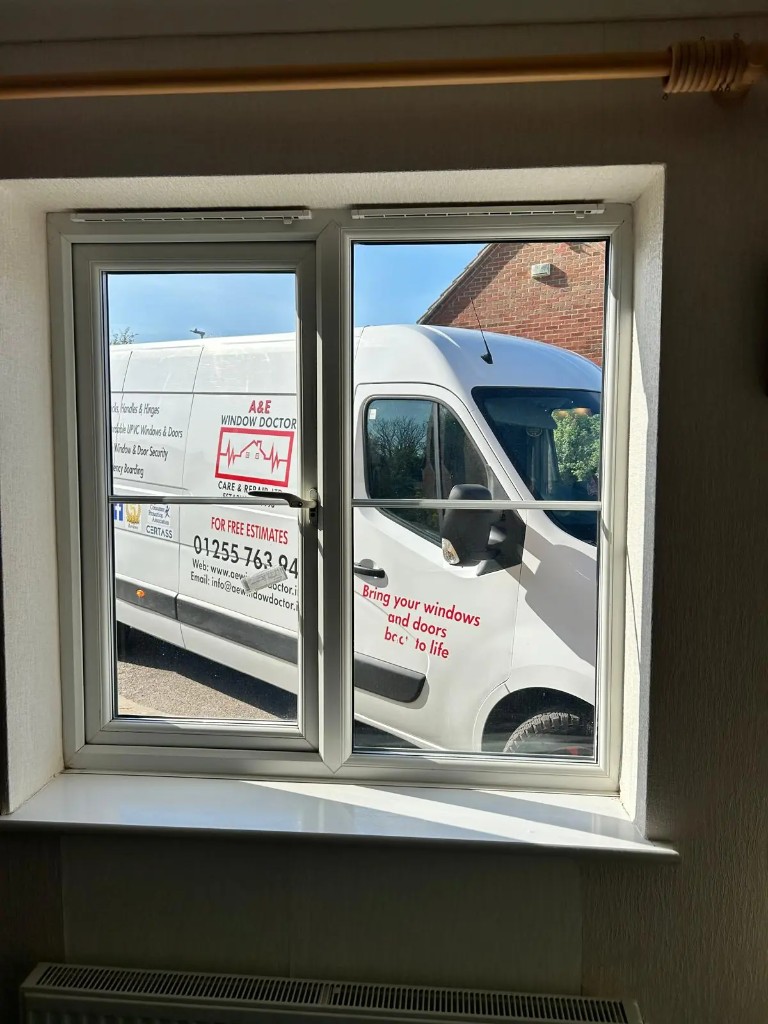 New white uPVC window installation in Essex with A and E Window Doctor service van outside