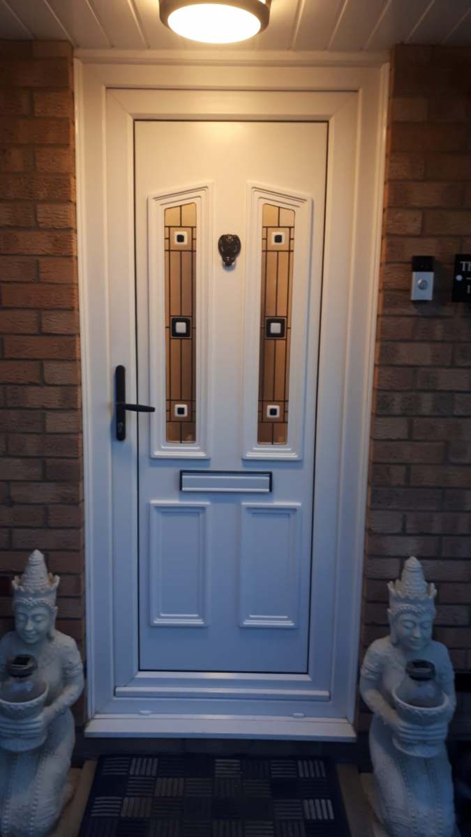 White composite front door fitted by A&E Window Doctor